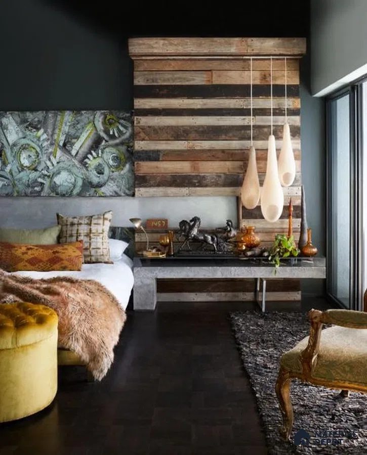 An elegant bedroom featuring a crystal chandelier and luxurious bedding.